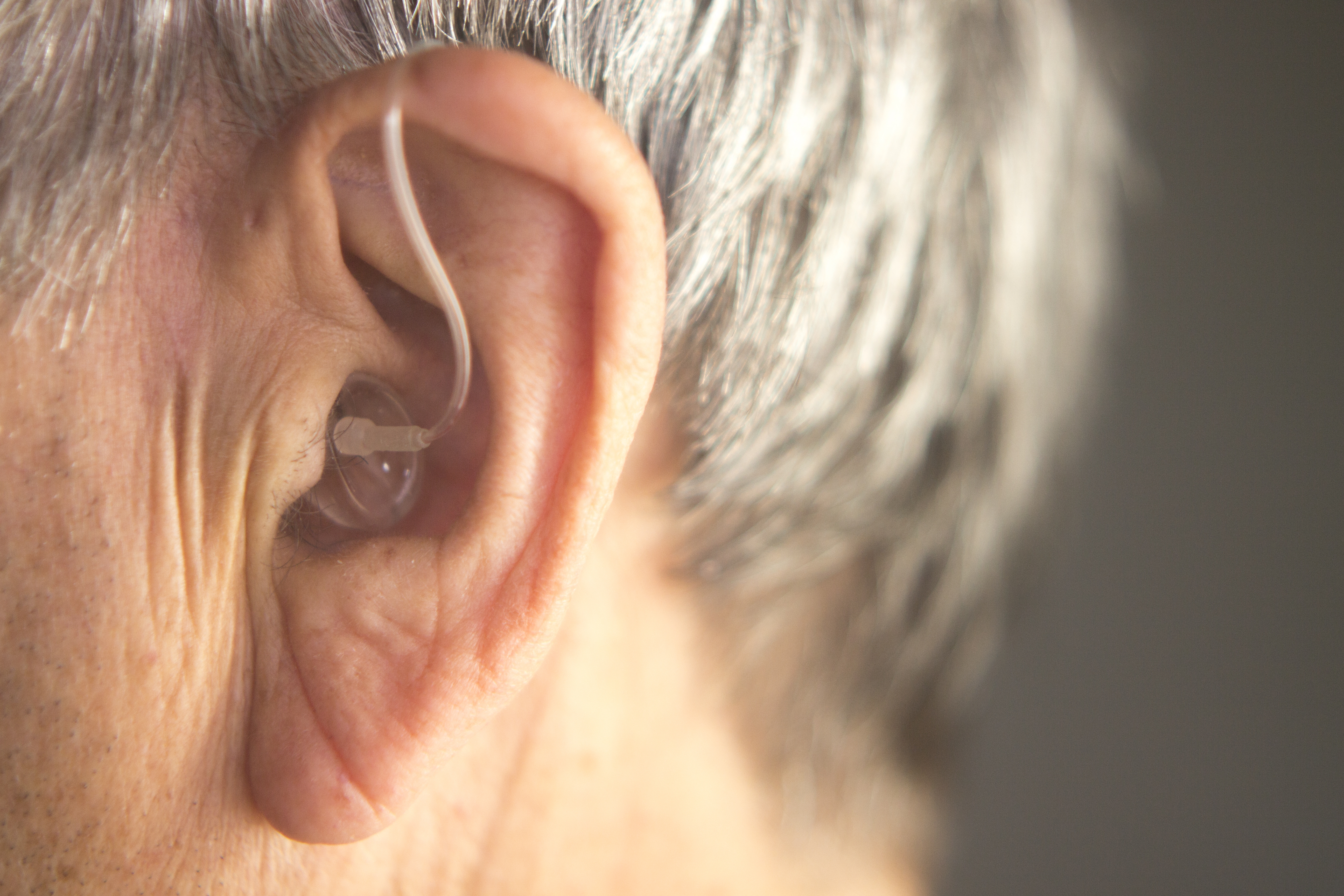 close-up-of-hearing-aid-wearer.jpg