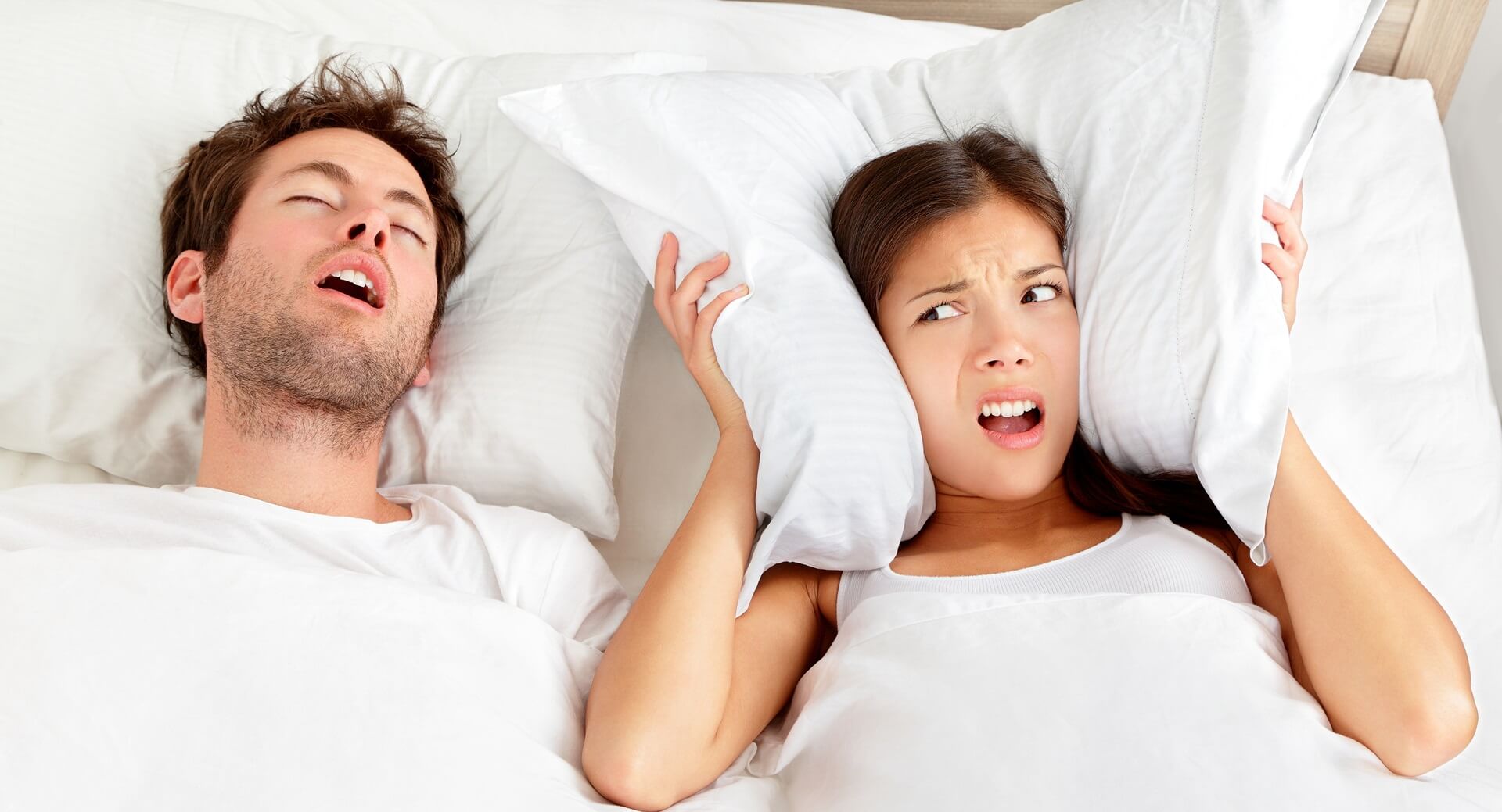 snoring-man-couple-in-bed-desktop-banner.jpg