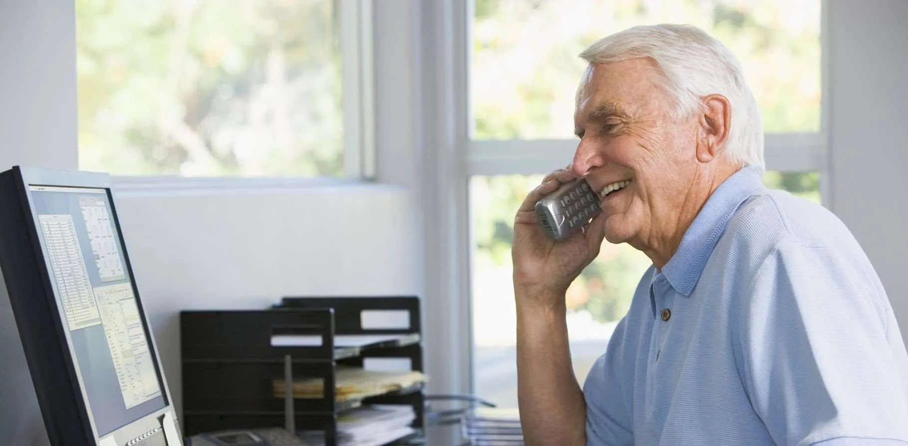 elderly-man-office-telephone.jpg