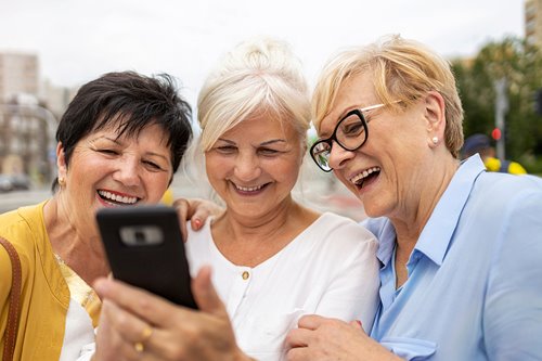 bigstock-group-of-senior-women-using-mo-376507069.jpg