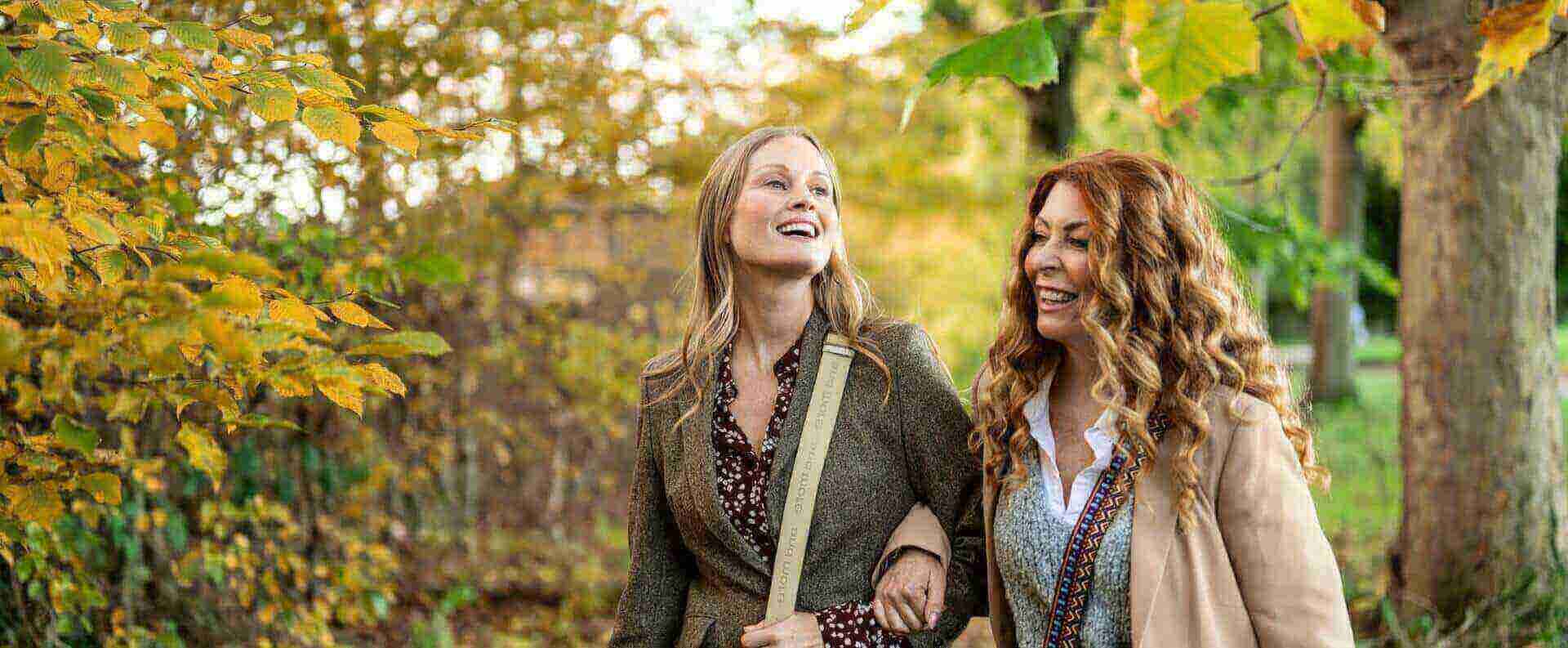 women-walking-through-woods-desktop-banner.jpg