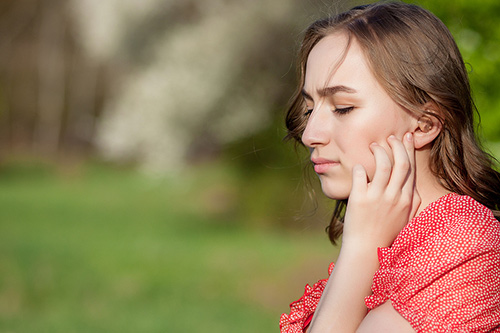 close-up-of-female-hands-put-on-her-ear.jpg