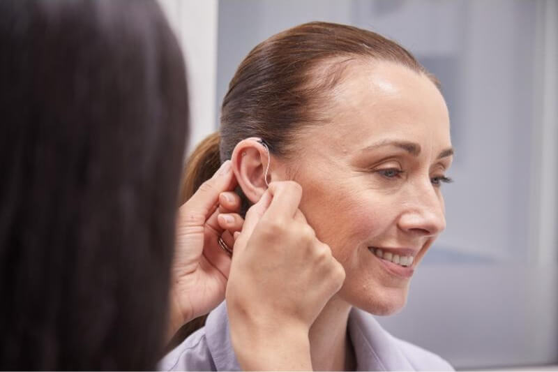 women-having-hearing-aid-fitted.jpg