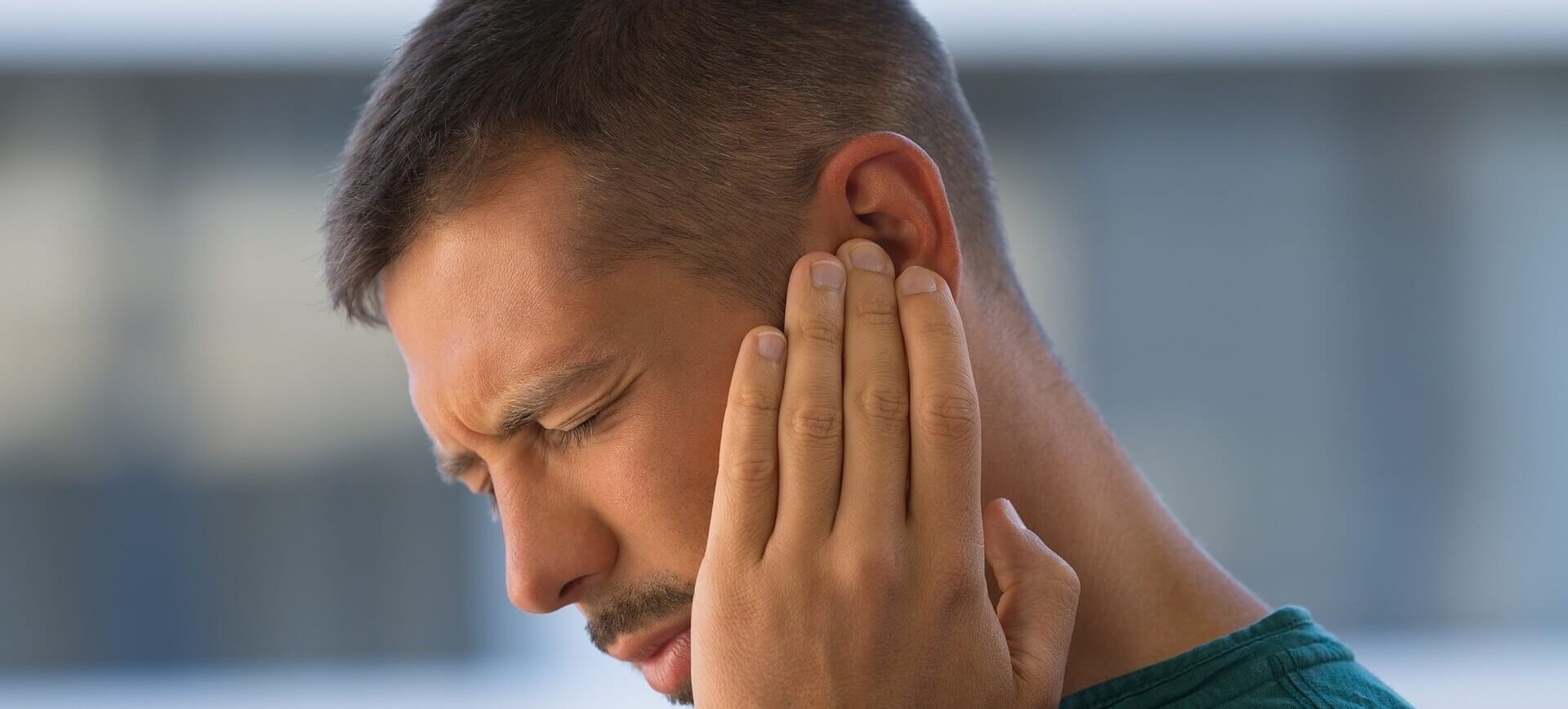 man-with-earache-desktop-banner.jpg
