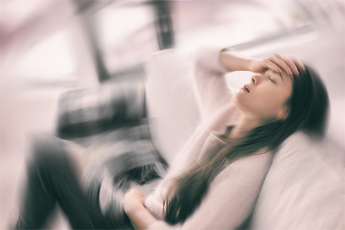 sick-woman-with-headache-500.jpg