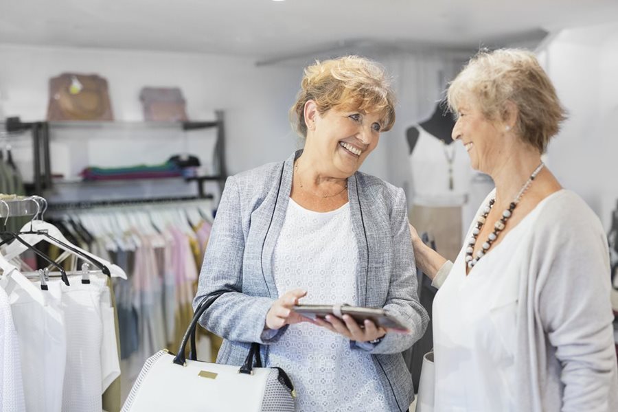 woman-with-hearing-aids-shopping-with-friend.jpg