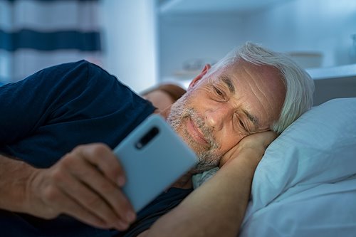 bigstock-senior-man-watching-video-on-s-371604097.jpg