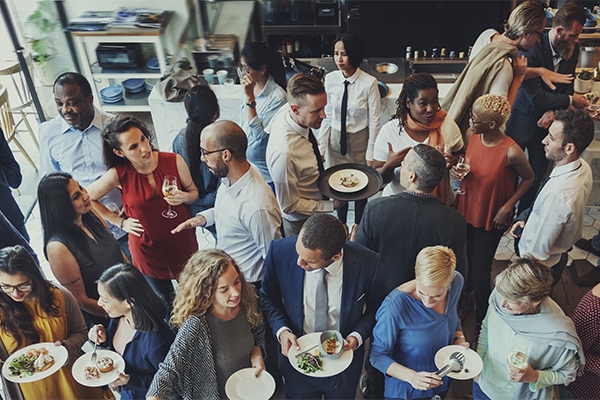 A crowded noisy restaurant where its hard to hear.