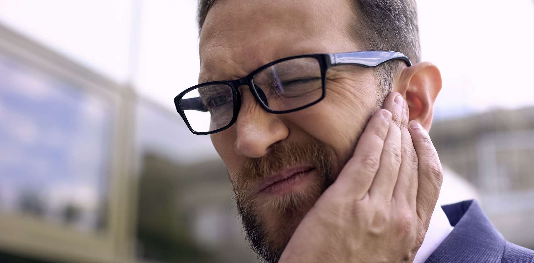 desktop_banner_1821x896_Male-Has-Ear-Pain-348177937.jpg