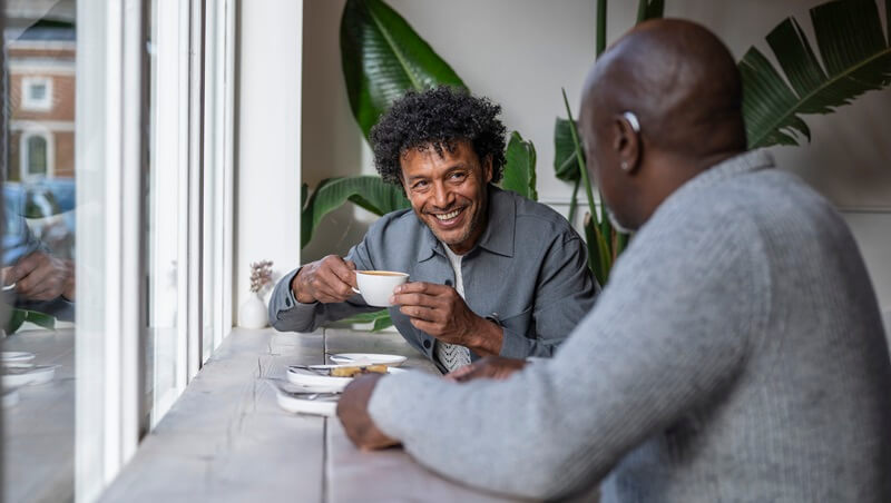 men-talking-in-coffee-shop.jpg