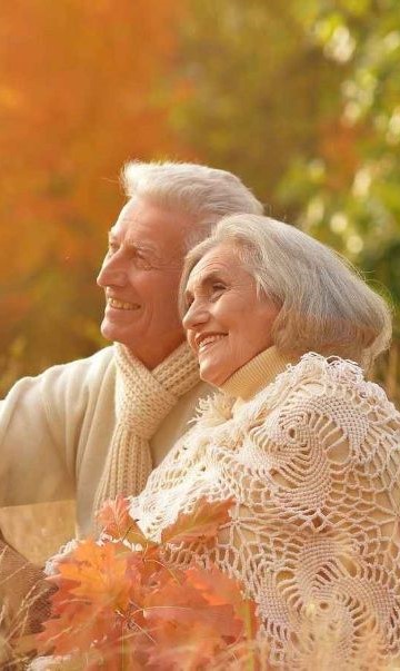 elderly-seniors-couple-sitting-nature.jpg