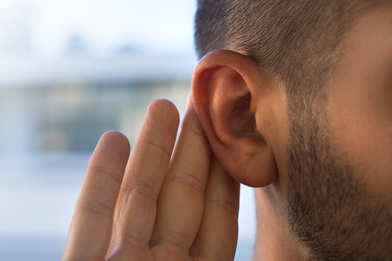young-man-with-hearing-problem.jpg