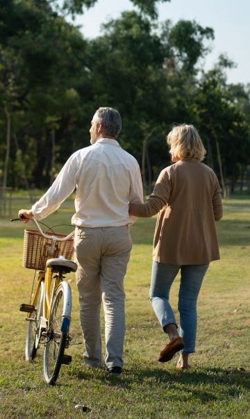 behind-elderly-couple-bycicle.jpg