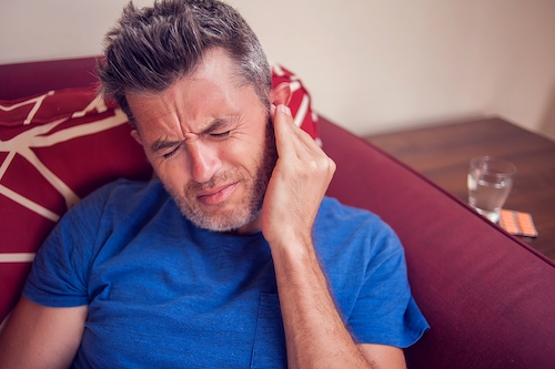 bigstock-man-feels-strong-ear-pain-peo-312084079 .jpg