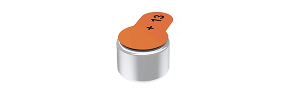 Image of orange hearing aid battery size 13.