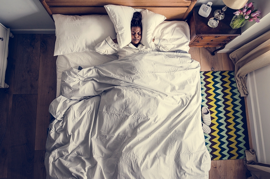 bigstock-african-american-woman-on-bed-236006716_2.jpg