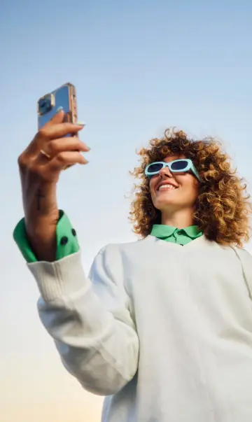 mobile banner 360x603_AN-24_Brand_20sWomanTakingSelfie_Stocksy_5584271.webp