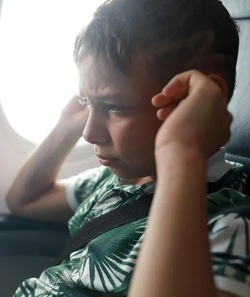bigstock-child-has-ear-pains-about-plan-383912495.jpg
