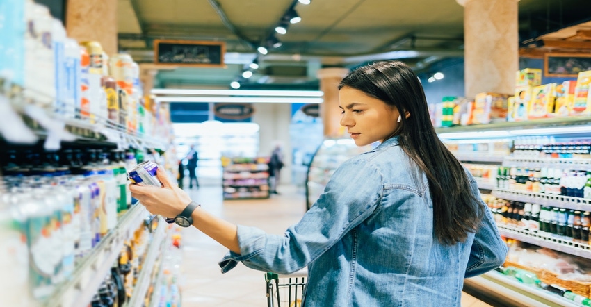 shopper checking food labels.jpg shopper checking food labels.jpg