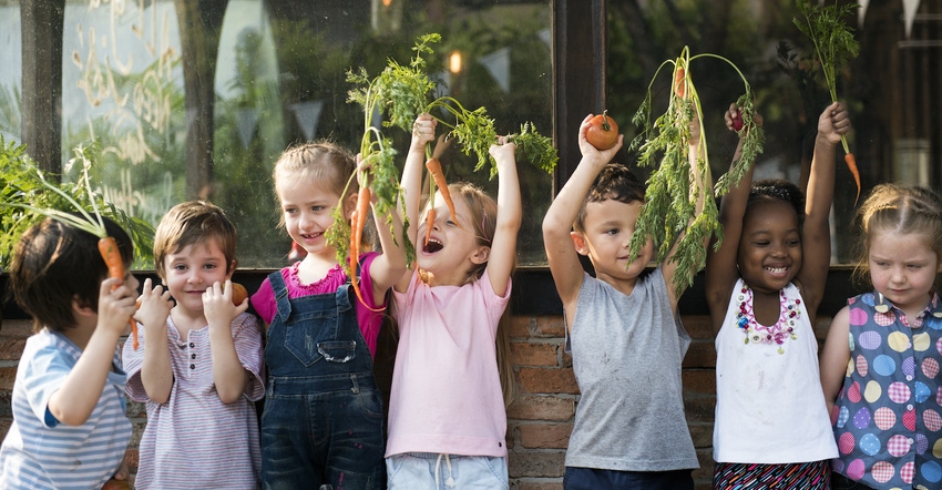 children holding veggies.jpg