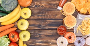 healthy food versus junk food on a wood backdrop.jpg