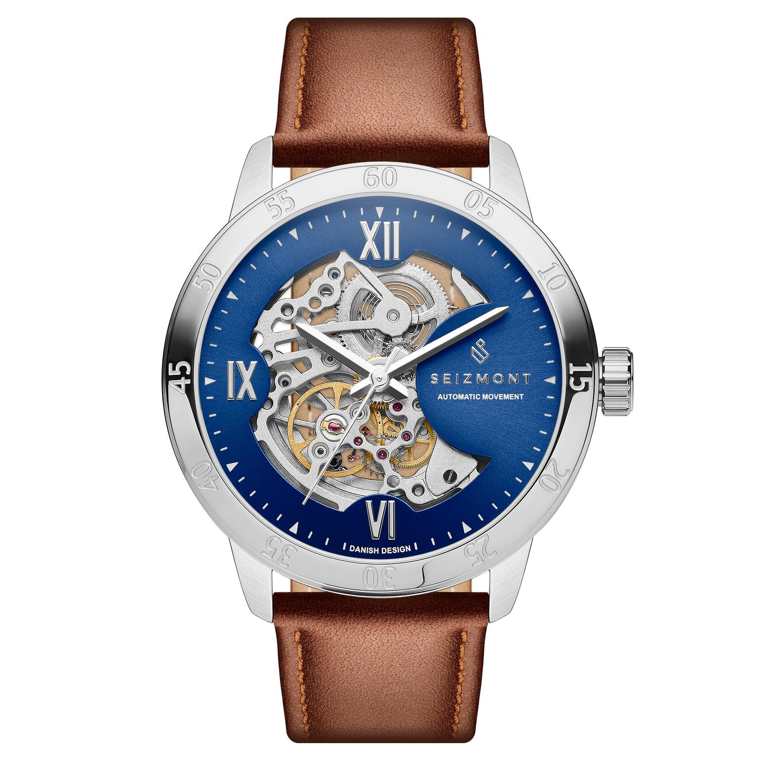 Dante II | Silver-tone and Blue Stainless Steel Skeleton Watch with Leather Straps Dante II | Silver-tone and Blue Stainless Steel Skeleton Watch with Leather Straps