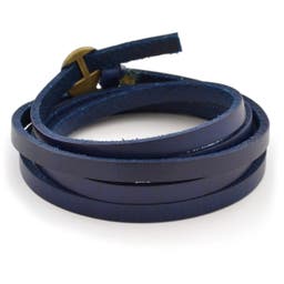 Pulsera de cuero trenzado ajustable azul