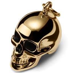 Amulette tête de mort en acier doré