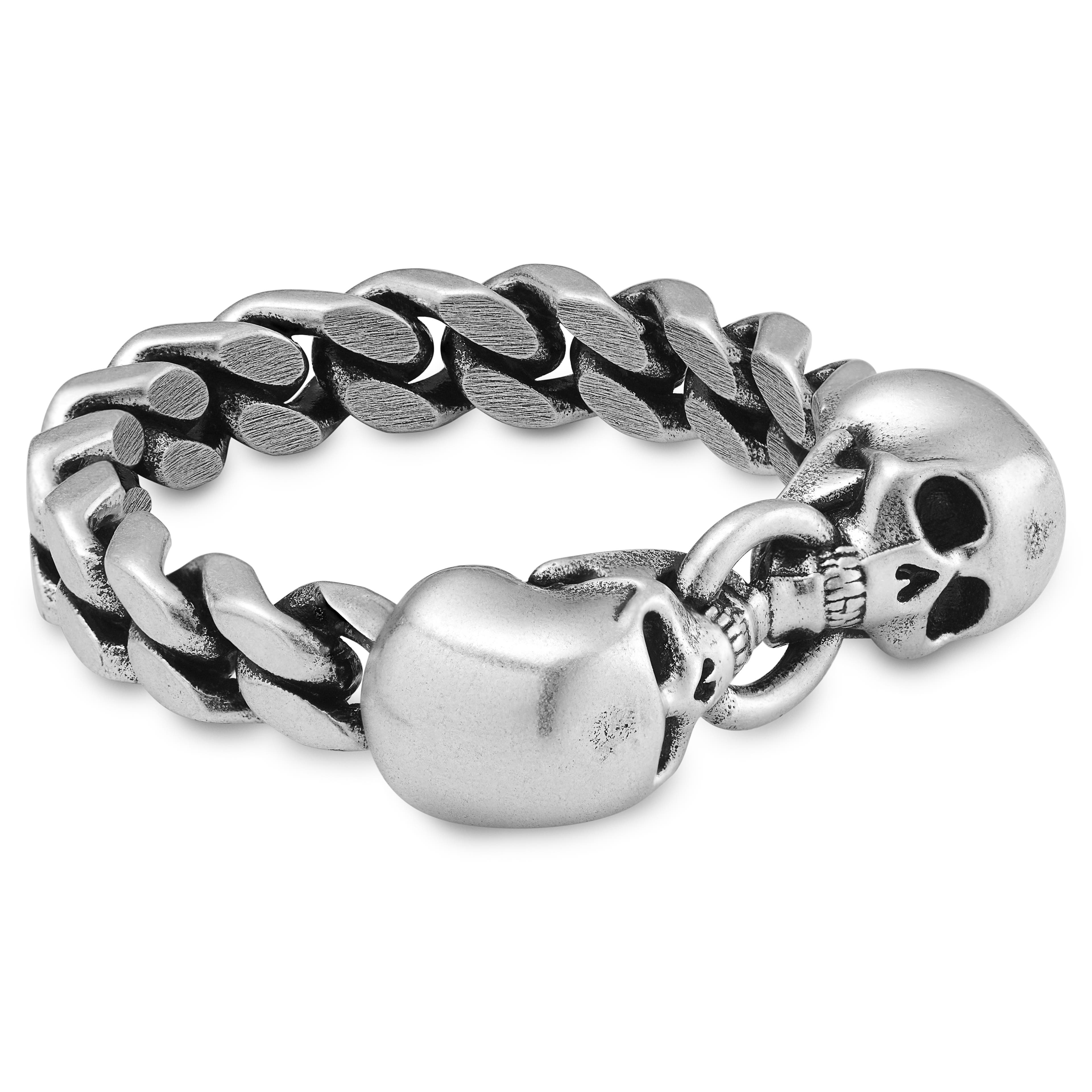 Aspero | Ezüst tónusú rozsdamentes acélgyűrű, két koponyával