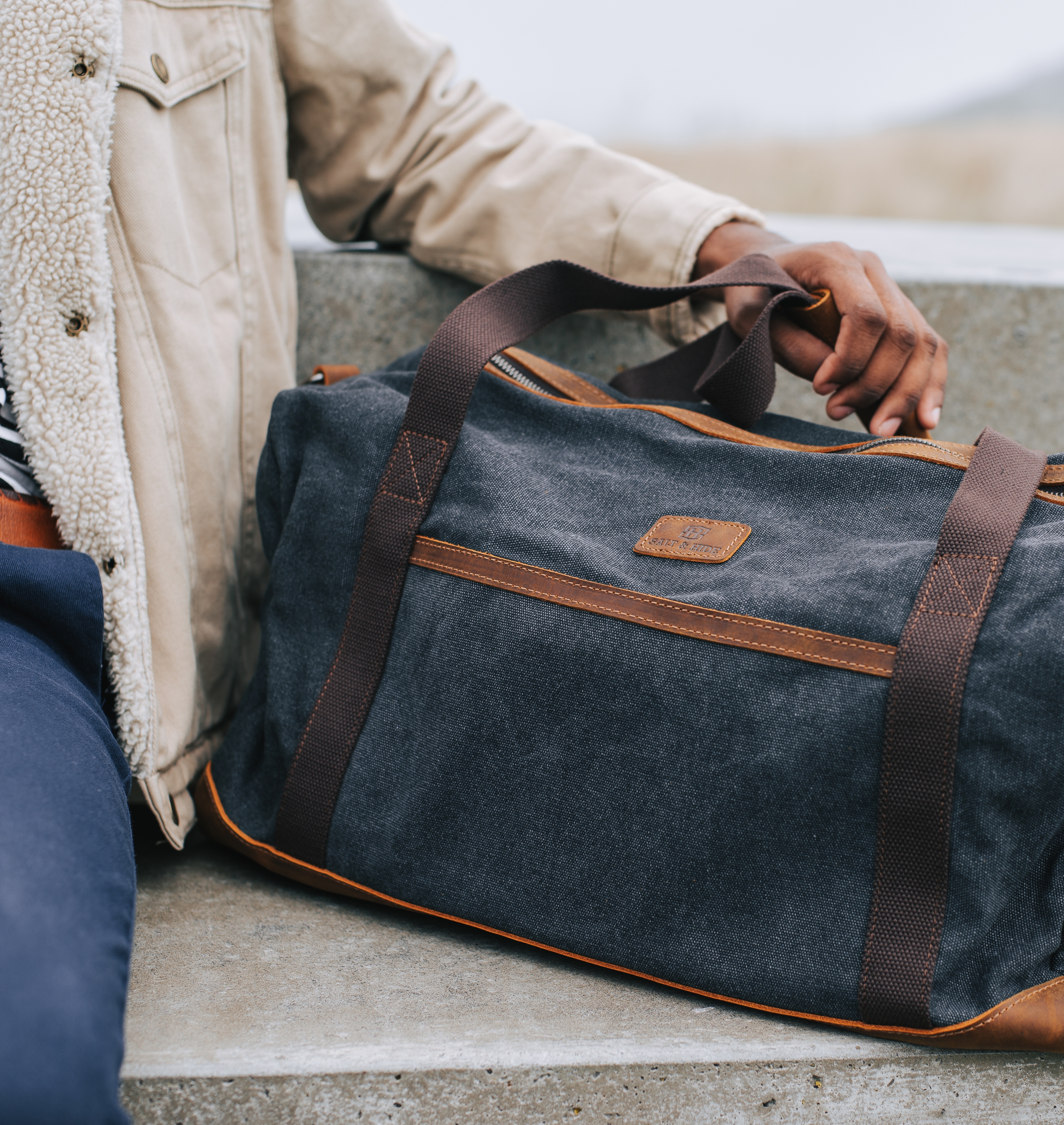 men carry bags