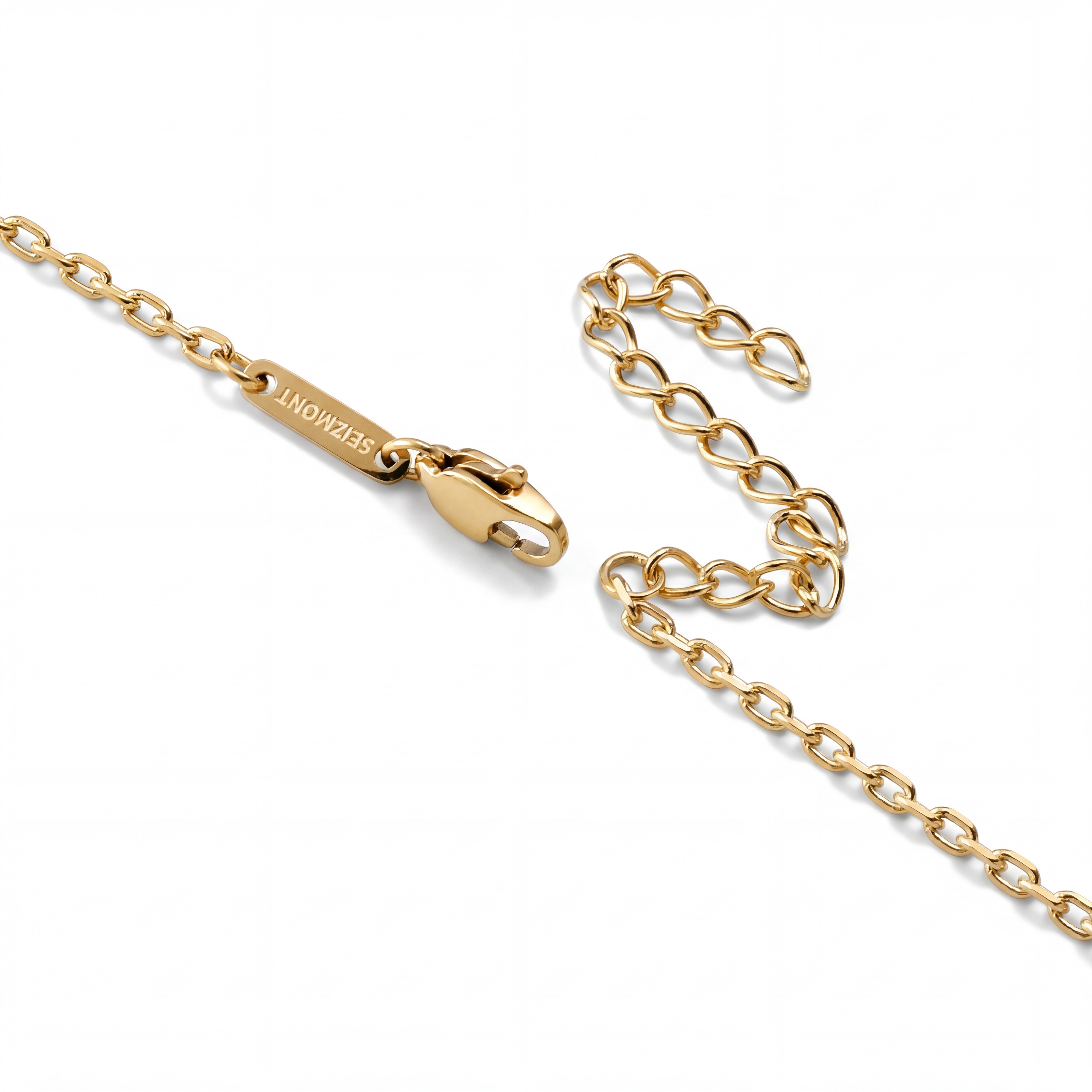 Magma | Verižica iz nerjavečega jekla zlate barve z valovitim obročkom, širina 4 mm
 - 5