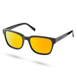 Gafas de sol polarizadas efecto espejo en negro y amarillo naranja Thea Wilmer