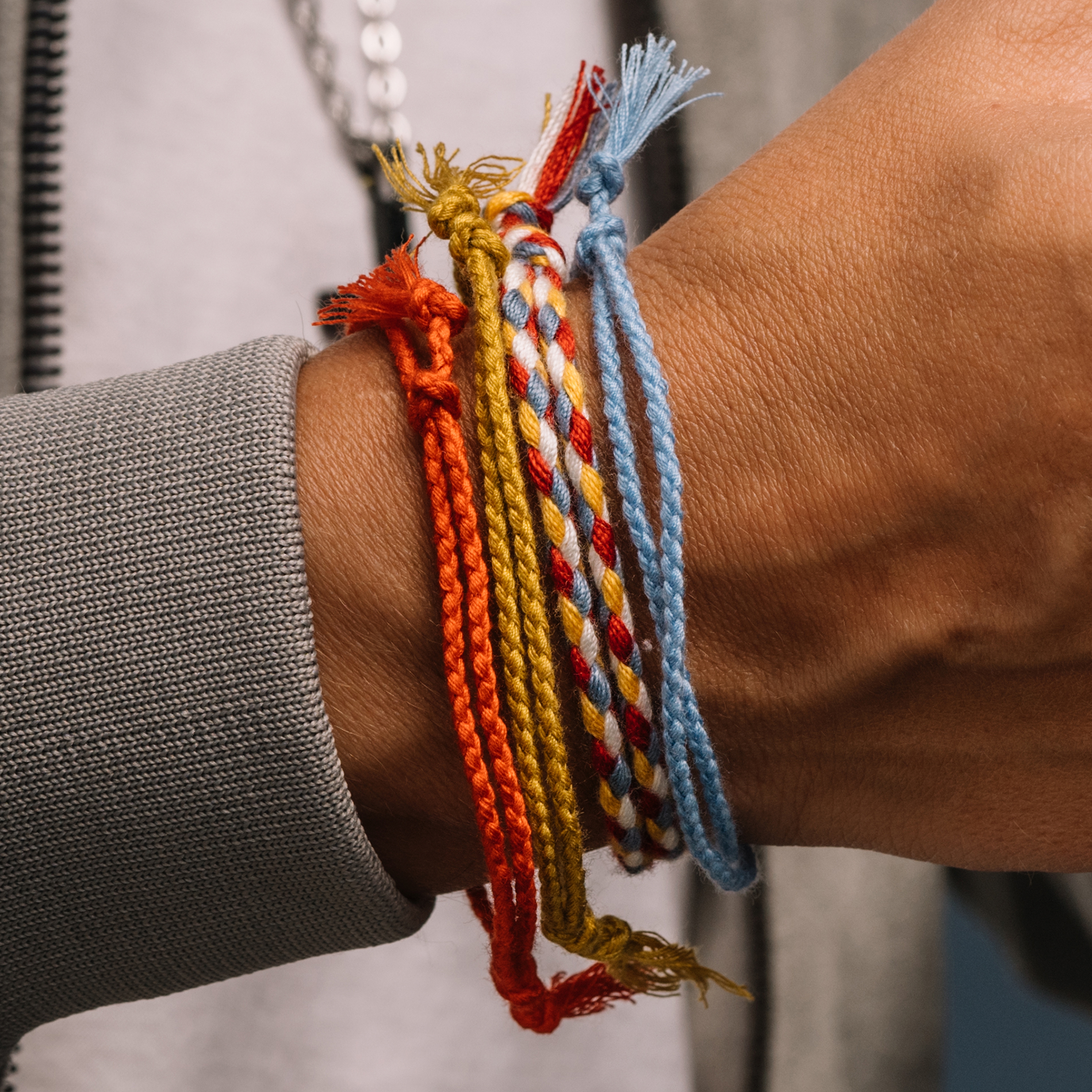 vermoeidheid Voorrecht kwaliteit Yellow, Red & Blue Braided Yarn Bracelet Set | In stock! | Waykins
