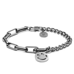 Srebrzysta bransoletka z łańcuszkiem kablowym i krawężnikowym z zawieszką z uśmiechem Clarke Amager