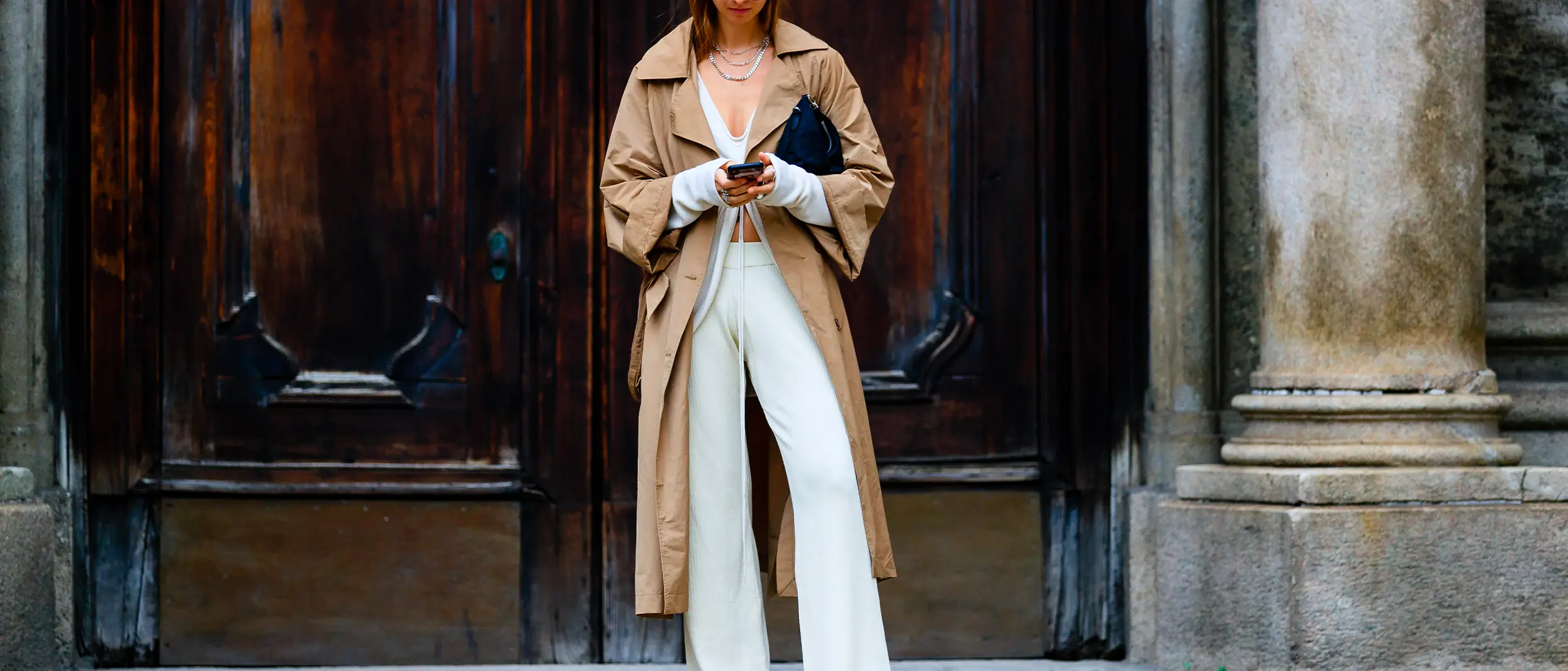 woman-beige-long-trench-coat-street-style-fashion-week.jpg