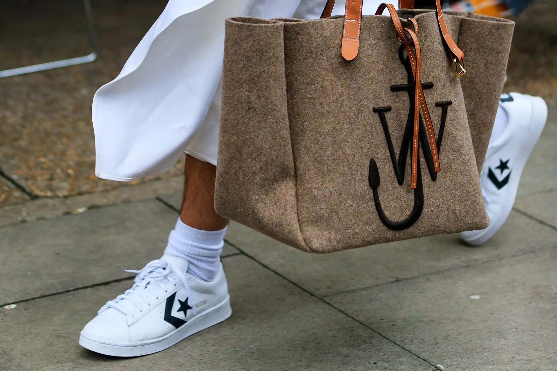 woman-walking-with-white-sneakers.jpg
