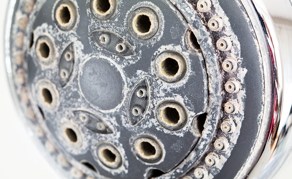 How do I remove shower limescale?