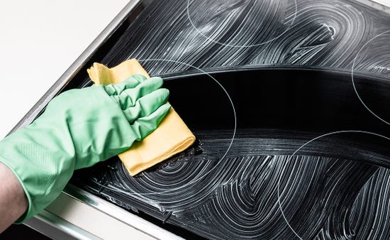How do I clean an induction hob?