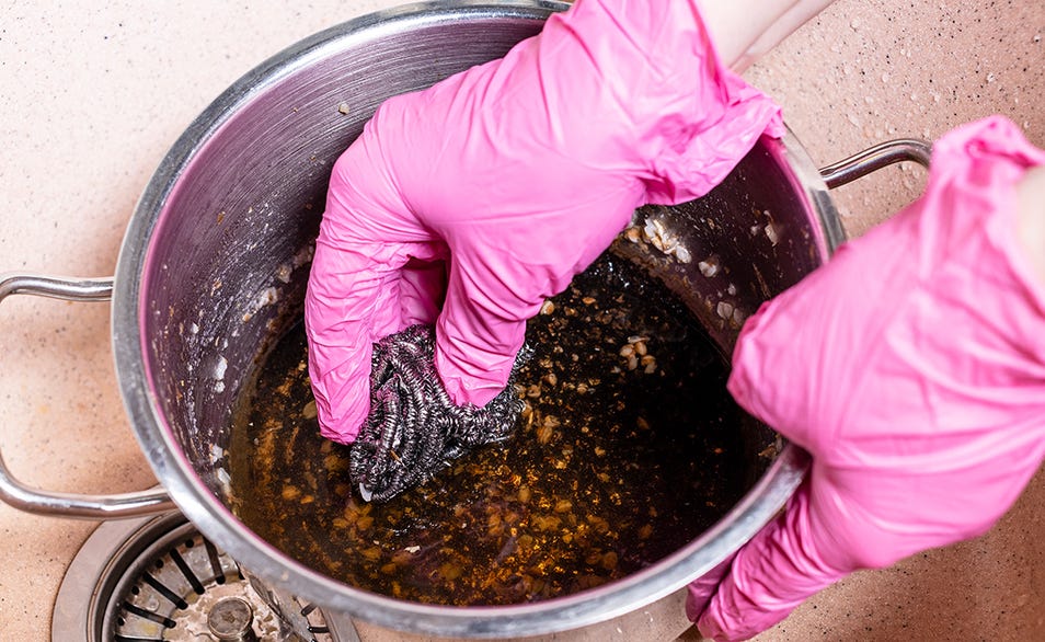 How do I clean a burnt pan or pot?