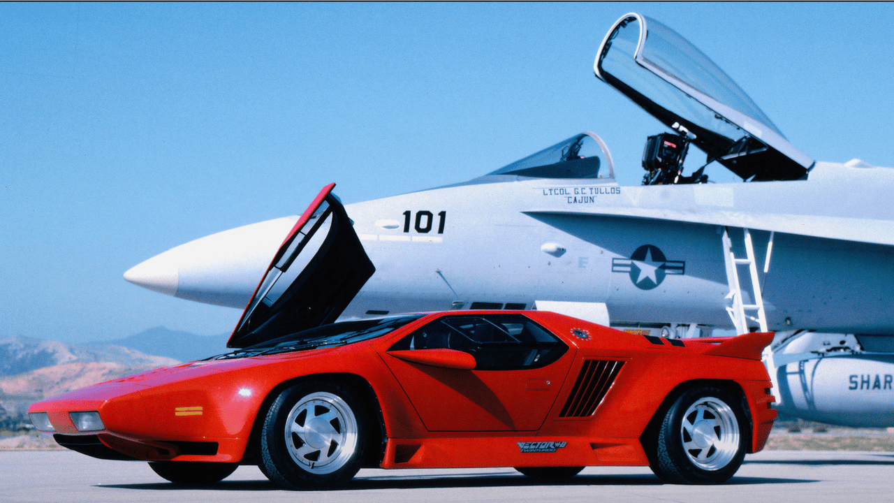 Red Vector supercar next to a plane