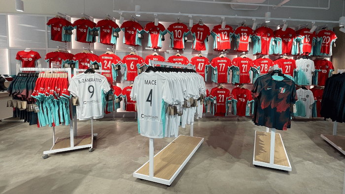 Kansas City Current player jersey wall at invenue retail store