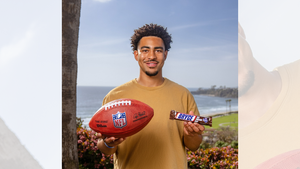 Bryce Young with the Snickers Bryce Cream Bar.