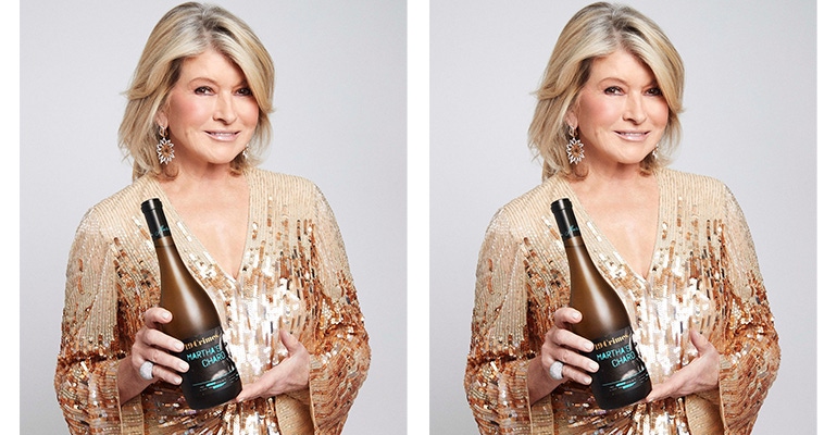 Martha Stewart holding a bottle of Martha's Chard
