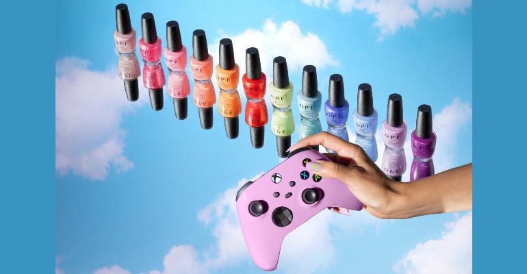 All 12 shades from the OPI XBOX collection. Also featured is an XBOX controller in a pink hue.