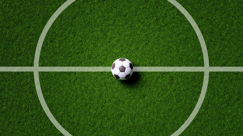 Football in the center circle of a pitch, credit: Shutter2U, iStock / Getty Images Plus