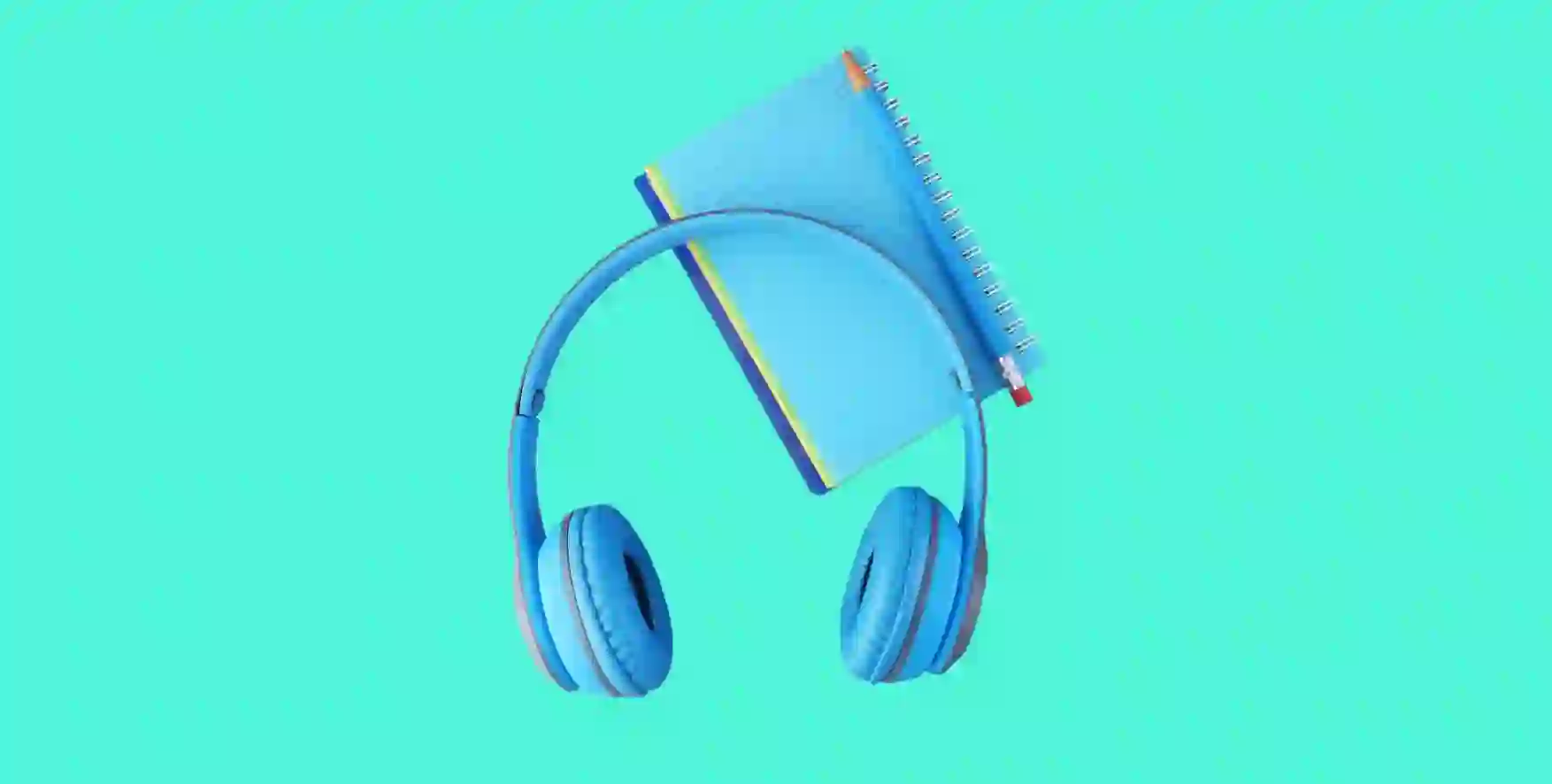 headphones and notepad with pencil