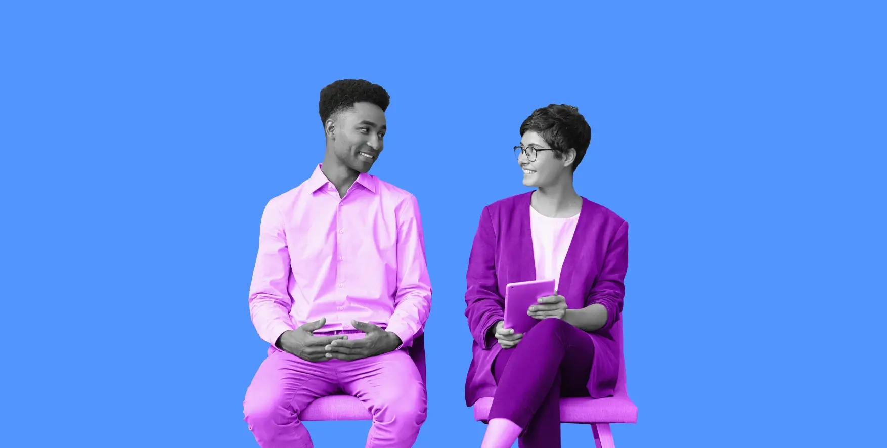 two people sitting next to each other during an interview