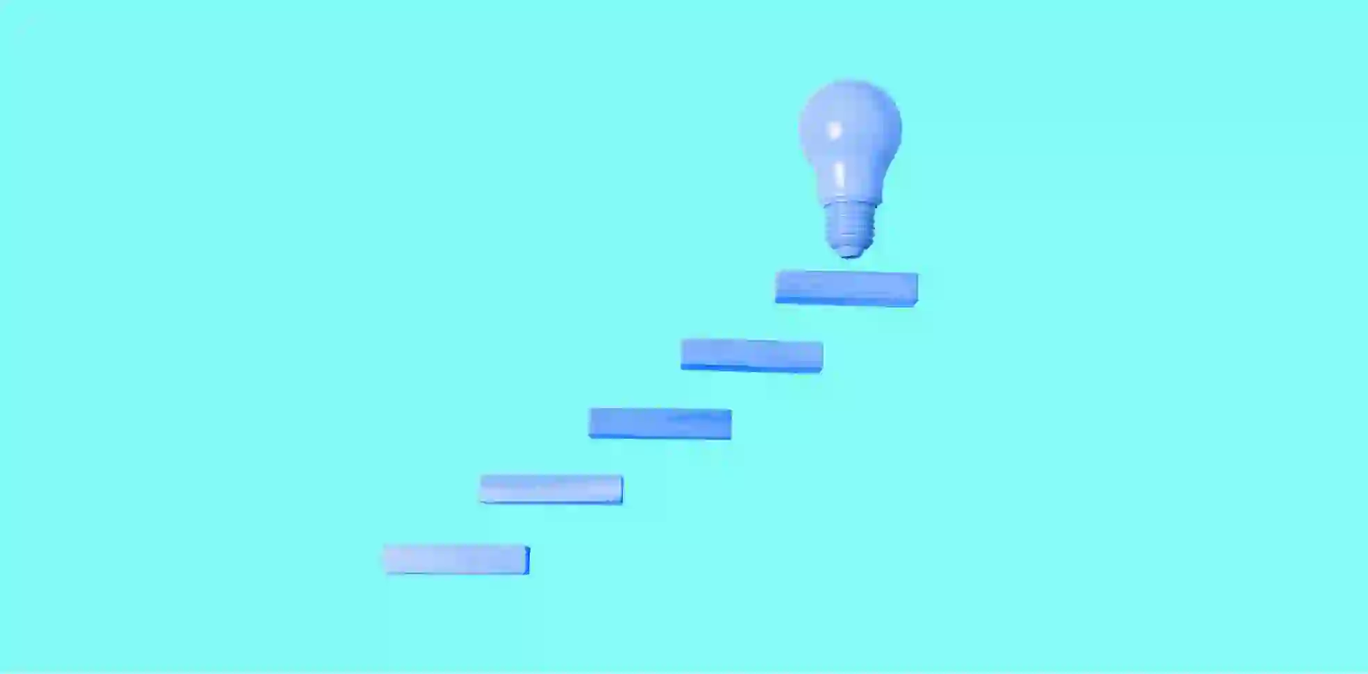 light bulb at the top of the stairs on blue background
