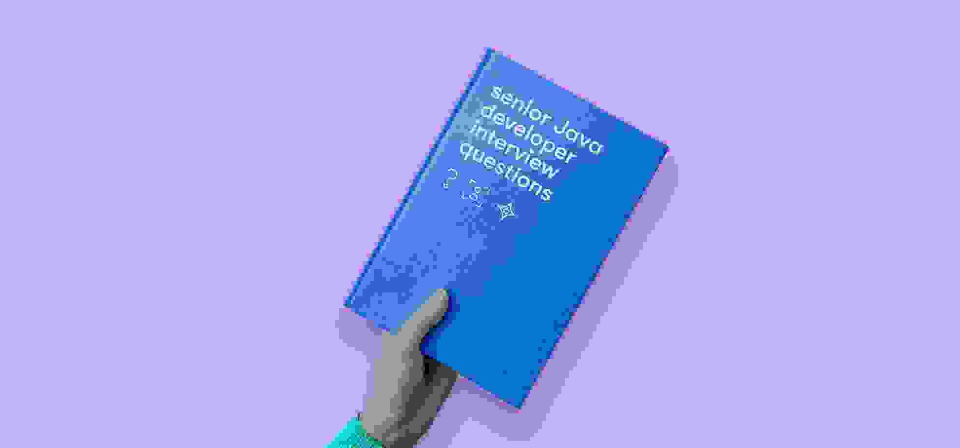hand with book "senior java developer interview questions"