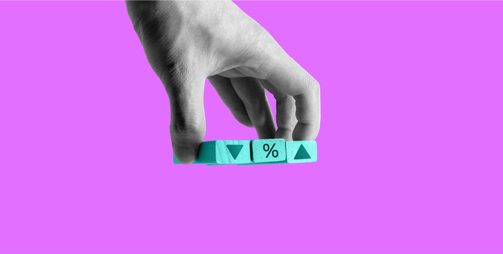 hand holding cubes with symbols on blue background